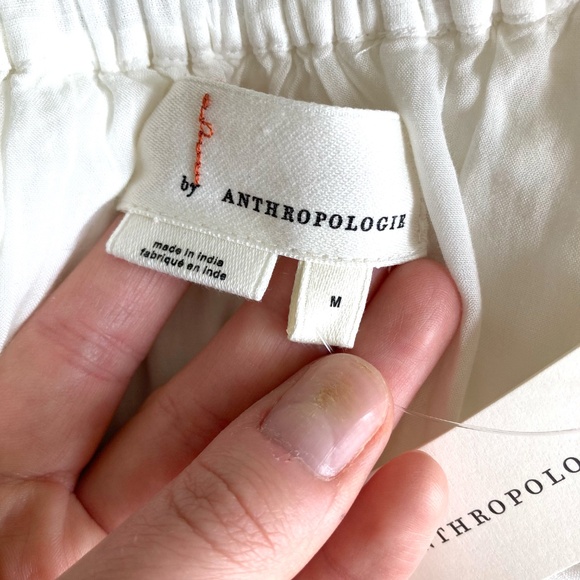 By Anthropologie EYELET ASYMMETRICAL MIDI SKIRT in Ivory - Picture 6 of 9